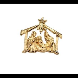 Gold Nativity brooch
